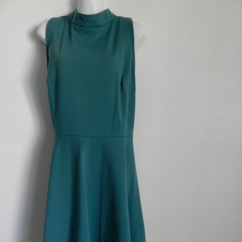 Christin Michaels jade green mock neck dress with fit and flare skirt